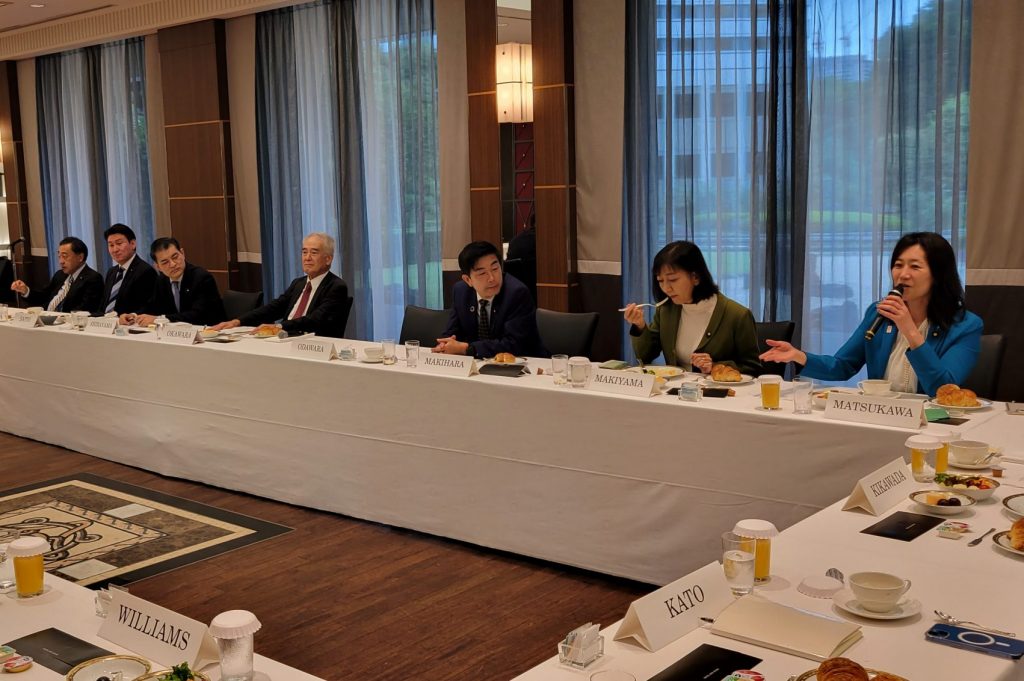 Participants take part in a breakfast roundtable with Japanese Diet members